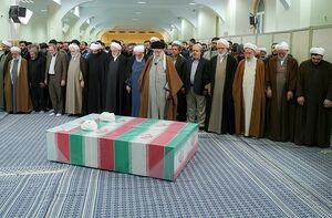 اقامه نماز بر پیکر شهیدان رازینی و مقیسه.jpg